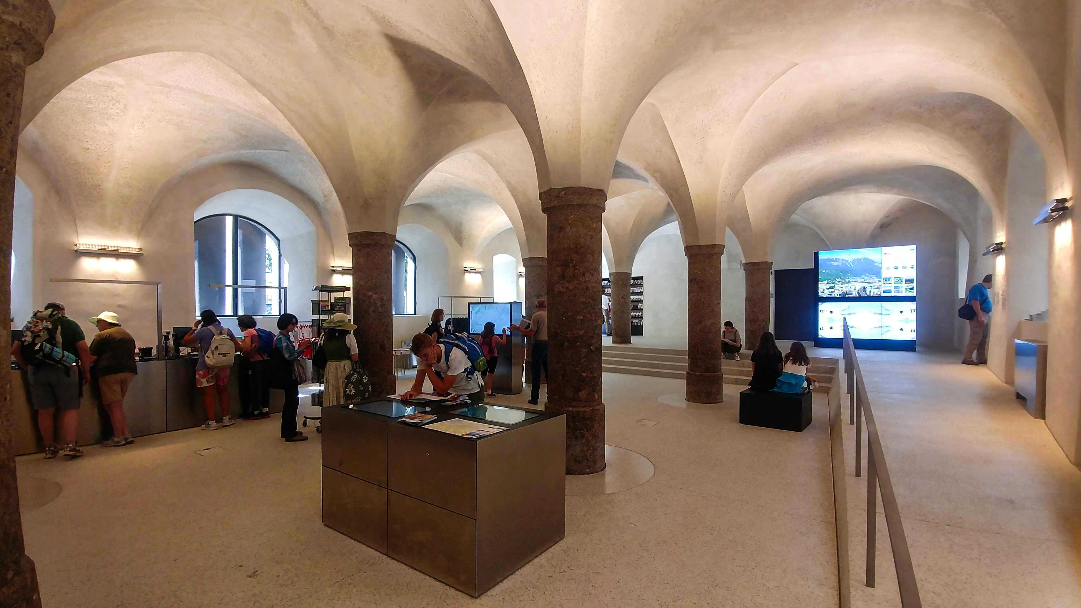 Modern touch screens and display walls offer information and experiences in the Innsbruck Information Center