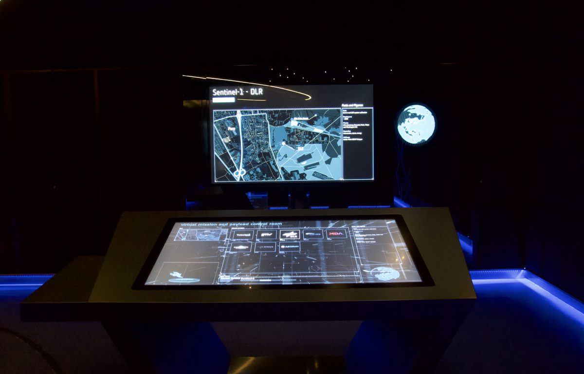 Multitouch table with presentation screen shows 3D satellite data