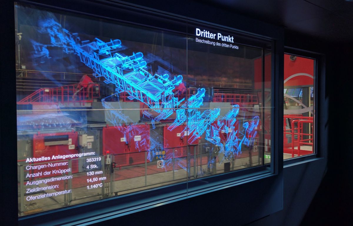 Industry 4.0 - transparent monitor with view into factory floor