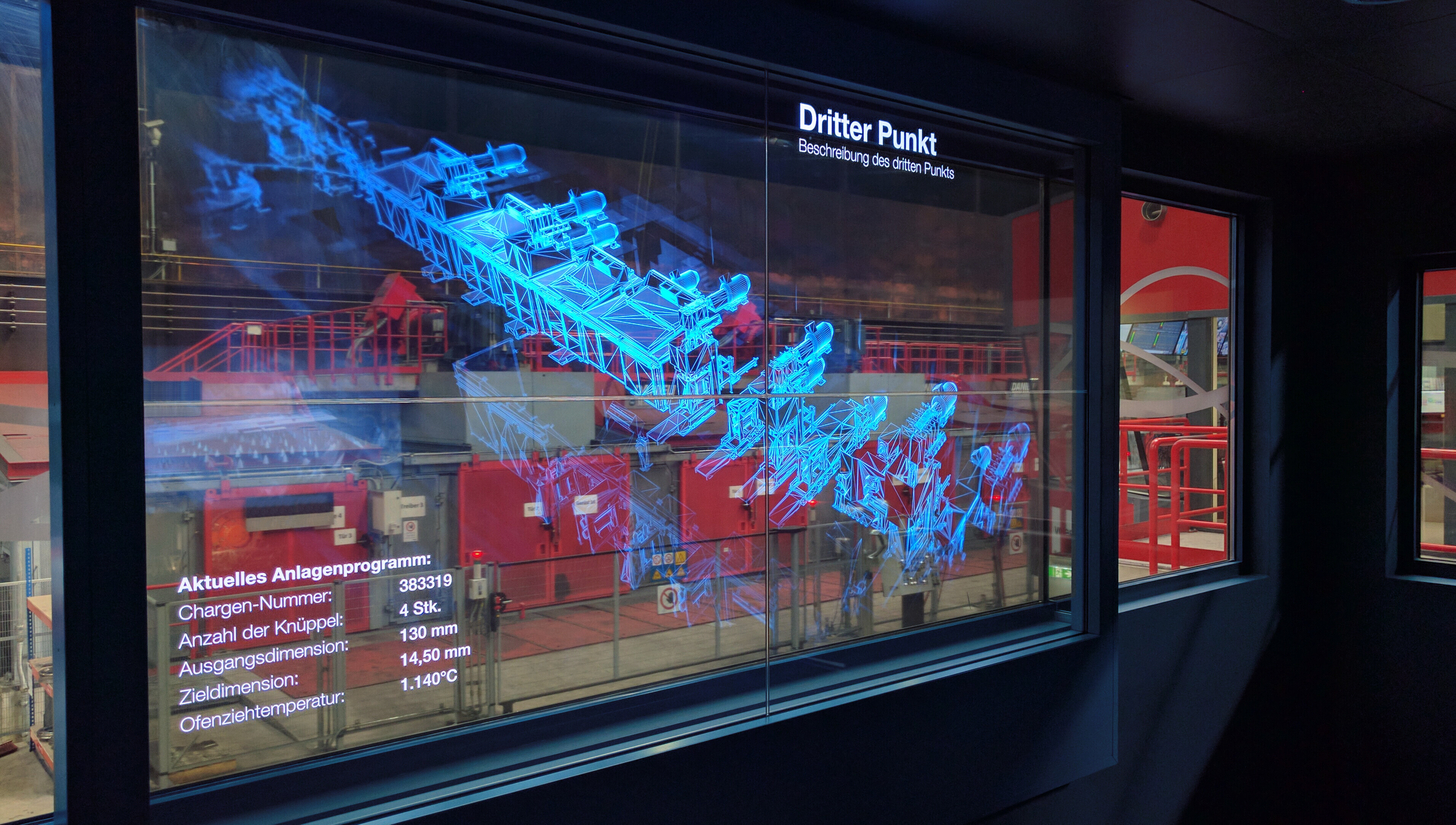 Industry 4.0 - transparent monitor with view into factory floor