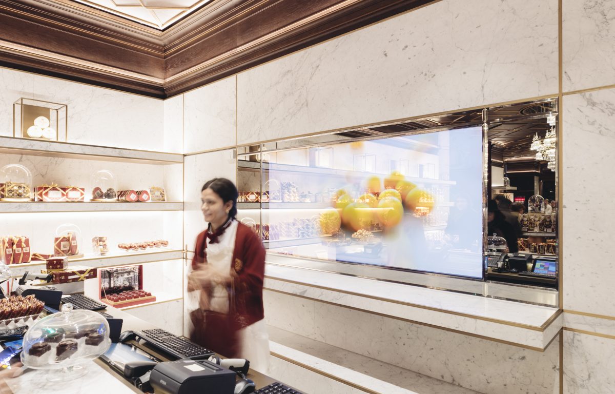 Monitor installed behind half-mirrored glass in the Hotel Sacher