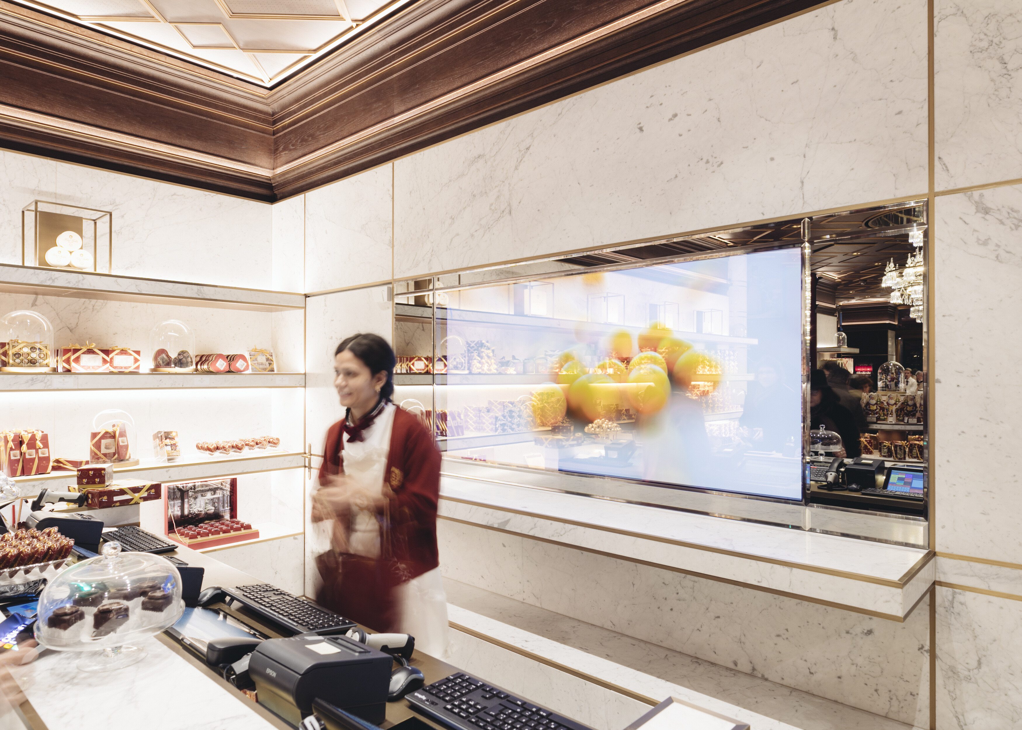 Monitor installed behind half-mirrored glass in the Hotel Sacher