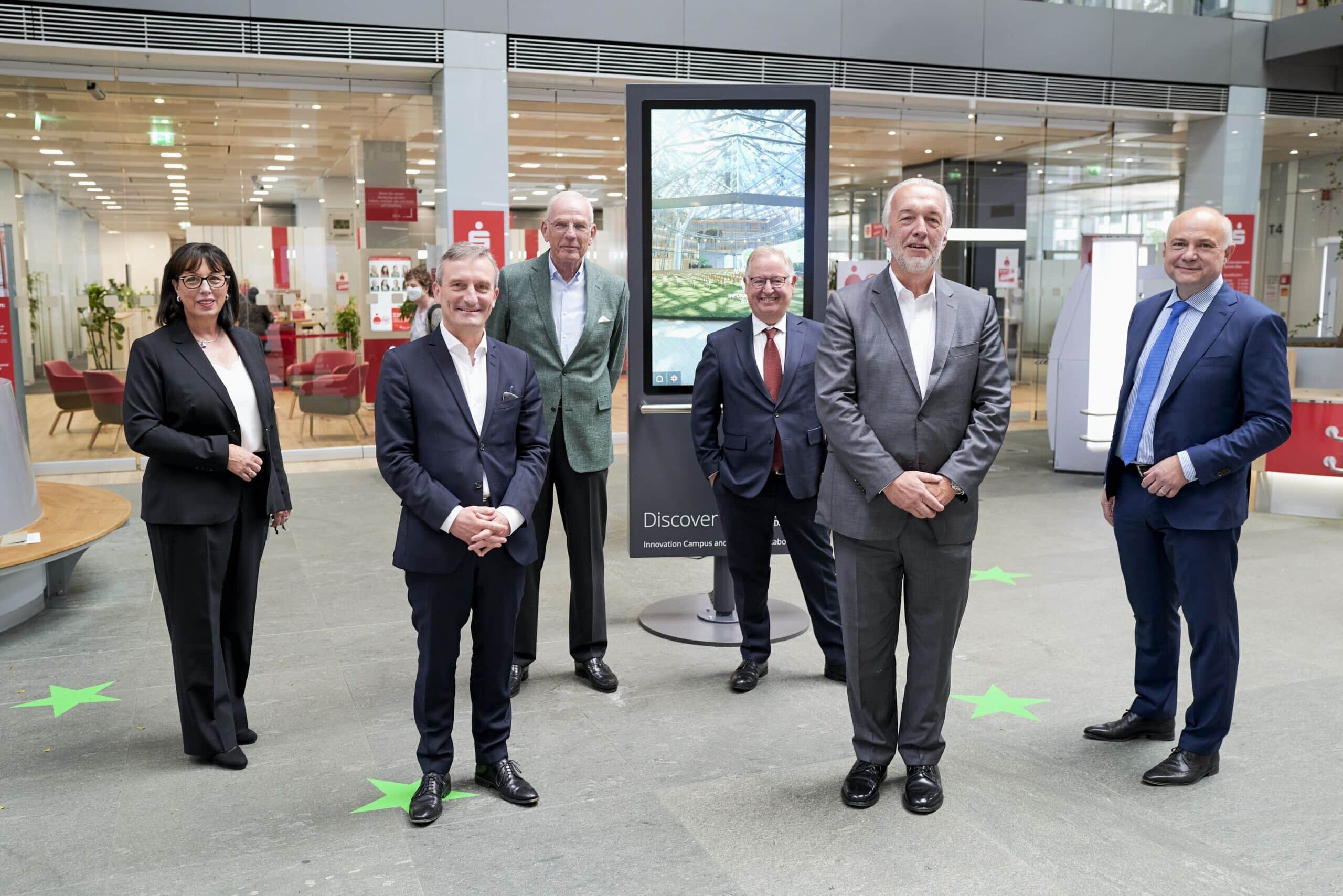 Interactive exhibition with multitouch turn screen in the Sparkasse Düsseldorf