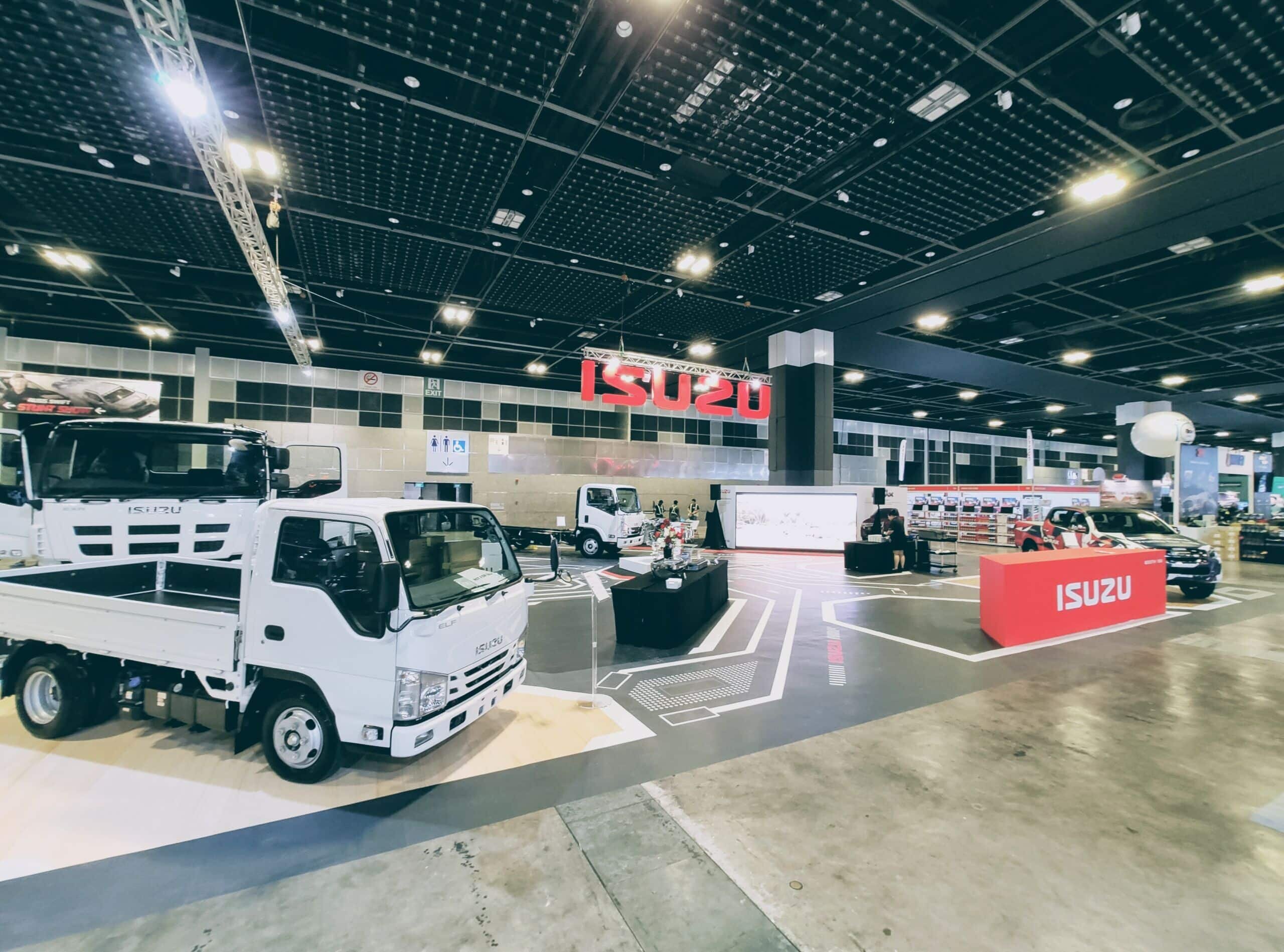 Isuzu stand with exposed engine block in the middle of the pavilion