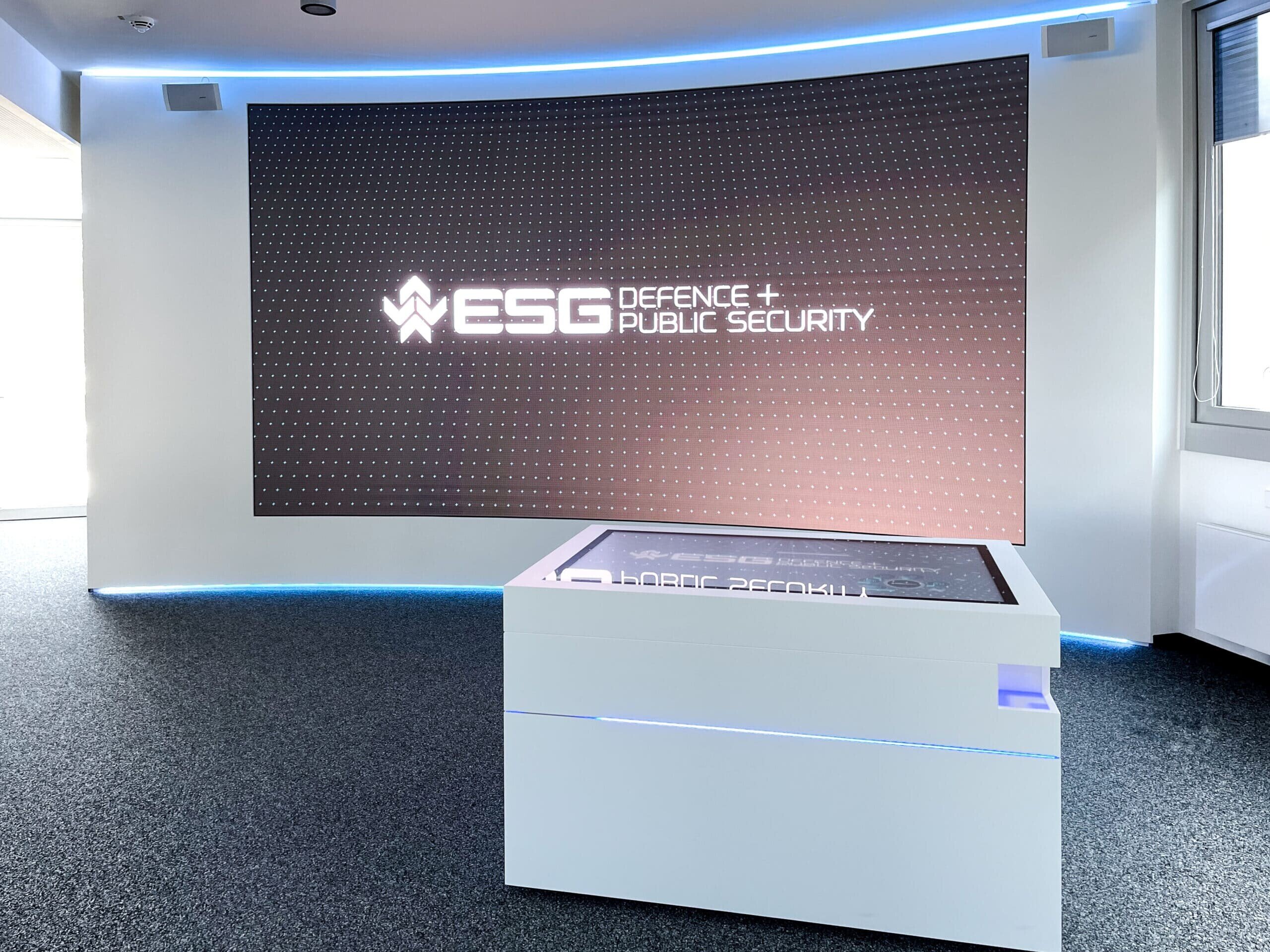 Showroom with LED wall and interactive touch table in white design