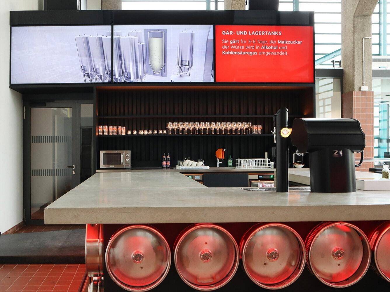 Interactive screens explain the brewing process