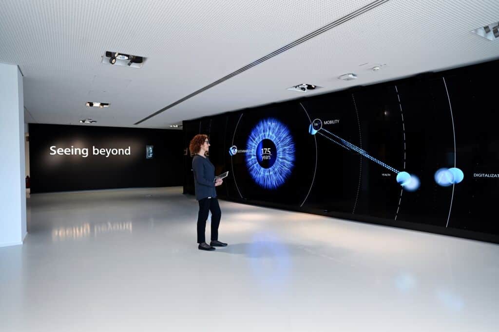 Zeiss 175-year display wall in interactive corporate exhibition