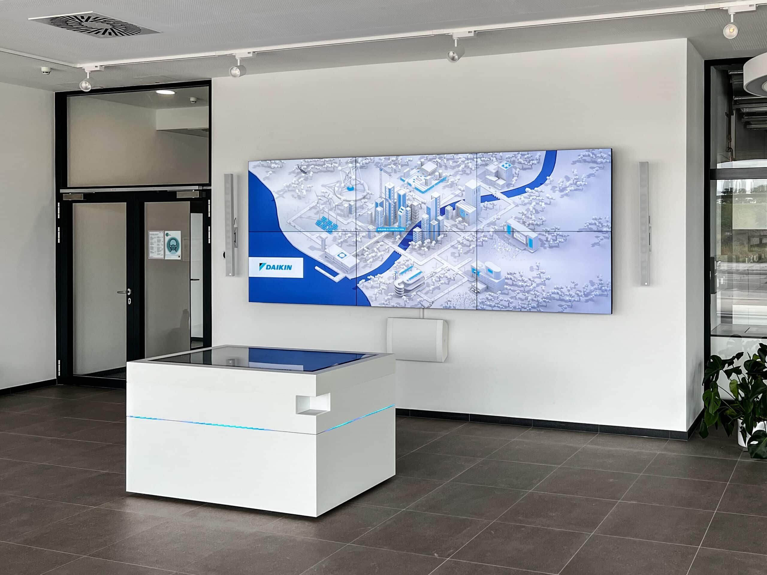 Daikin interactive showroom with multitouch table and screen wall