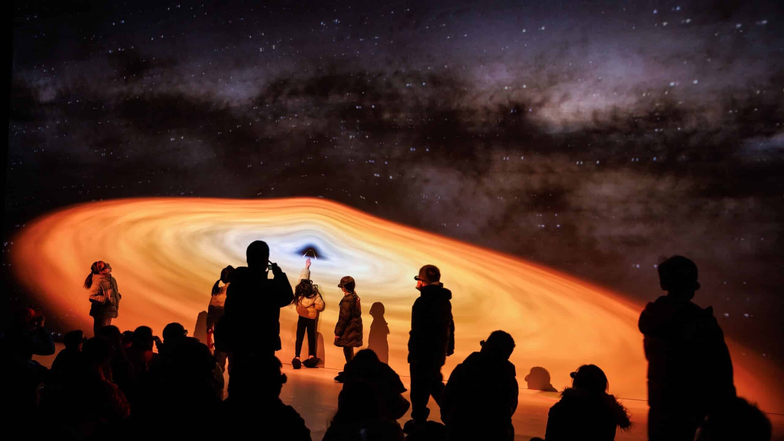 Immersive journey through the universe with wall and floor projection